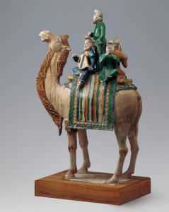 唐代 · 三彩釉陶载乐骆驼（中国国家博物馆）