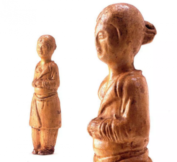 唐代 · 黄釉女俑（宁夏博物馆）